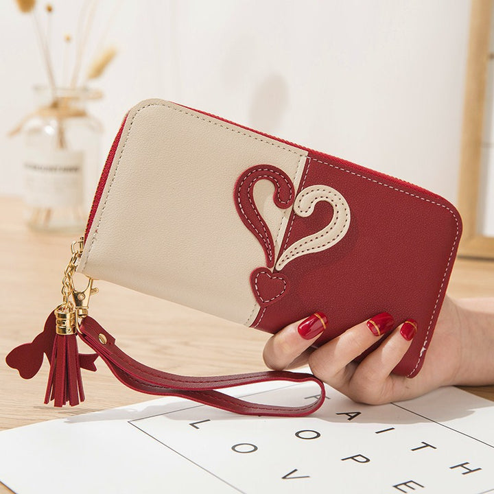 Stylish wallet with heart appliqués Kalsten