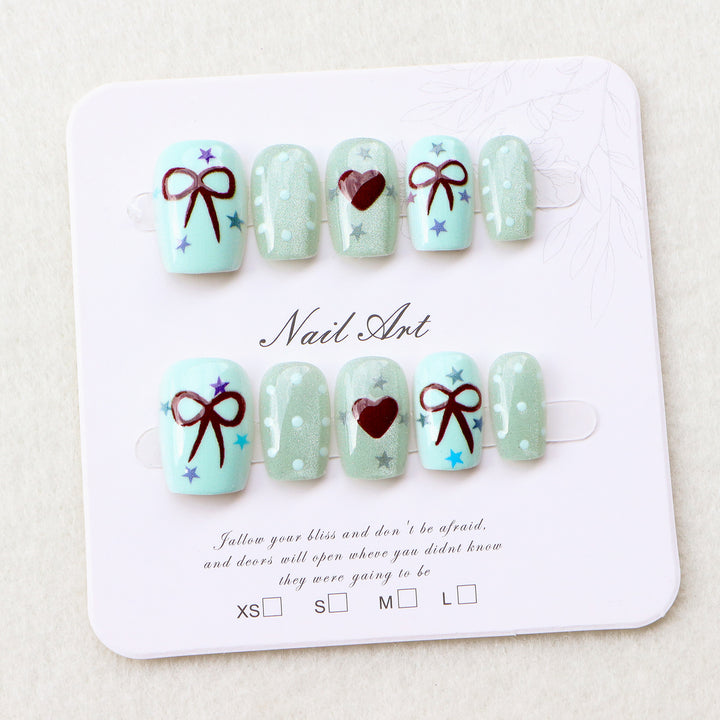 Decorative Nail Art Press-On Set with Bows and Hearts