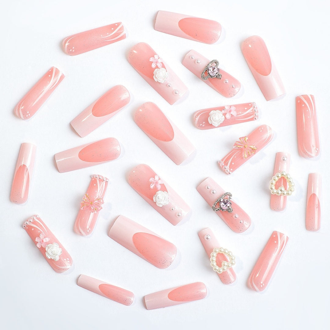 Elegant artificial nail set with glitter and floral accents Kalsten