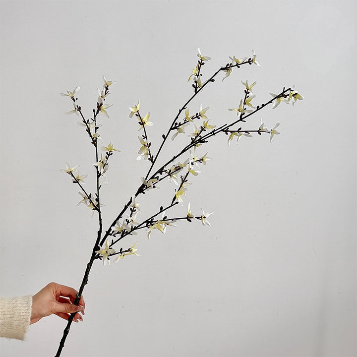 Artificial flower branch with intricately detailed yellow flowers