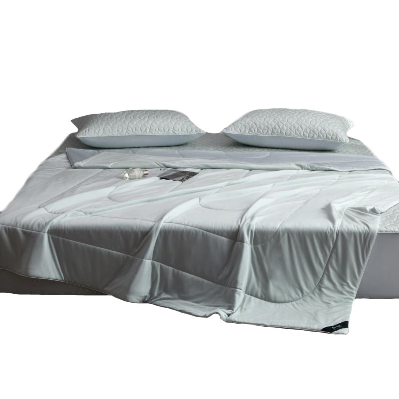 Quilted bedding set with reversible satin blanket and mattress protector