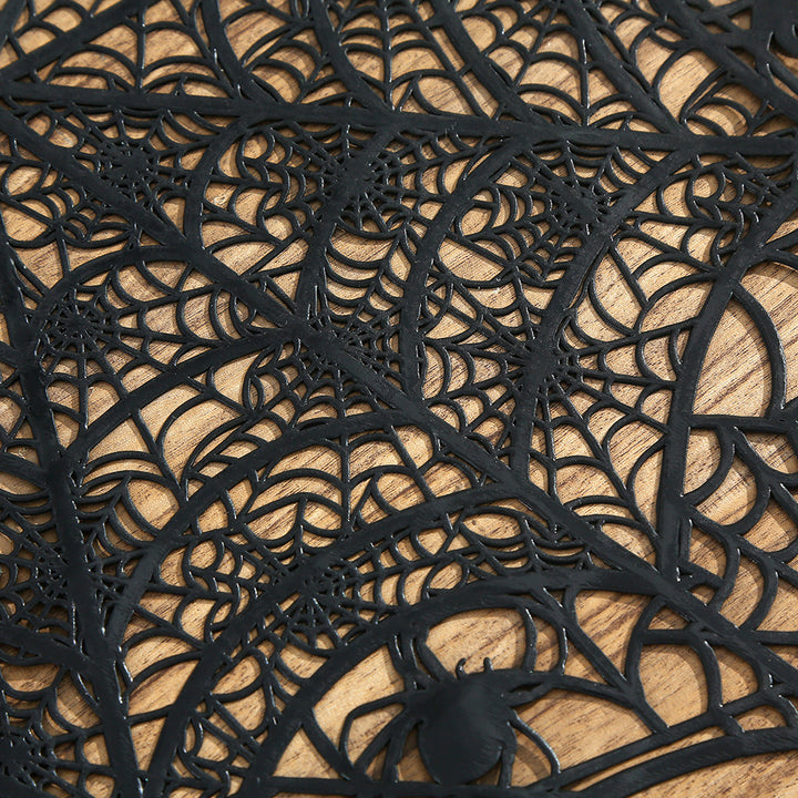 Flexible spiderweb table mat made of heat-resistant silicone as a placemat and decorative coaster with spider relief