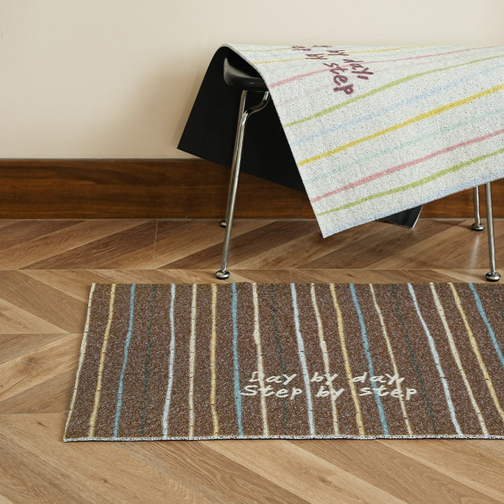 Durable entrance doormat with striped texture and "Welcome" lettering Kalsten