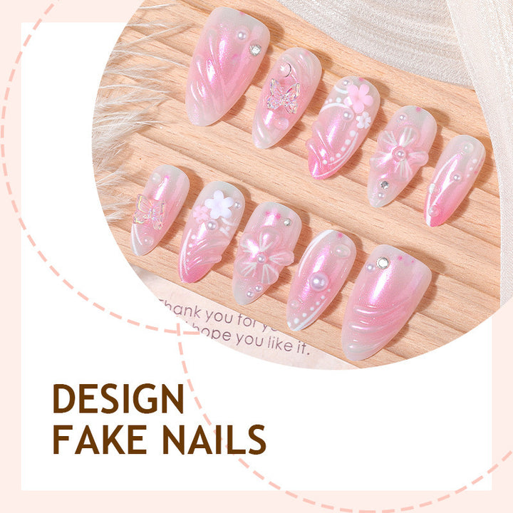 Artificial nail set with sparkling glitter and floral accents Kalsten