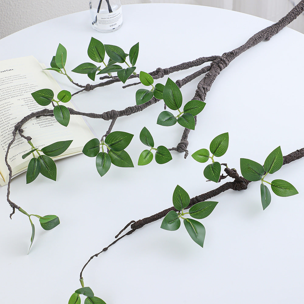 Decorative artificial tree branch with realistic leaves