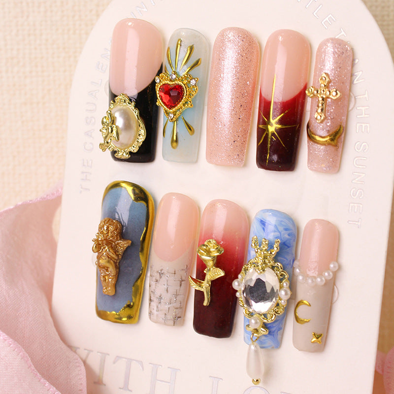 Acrylic nails with luxurious embellishments Kalsten