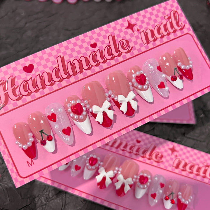 Artful Handmade Nail Art with Hearts and Ribbons Kalsten