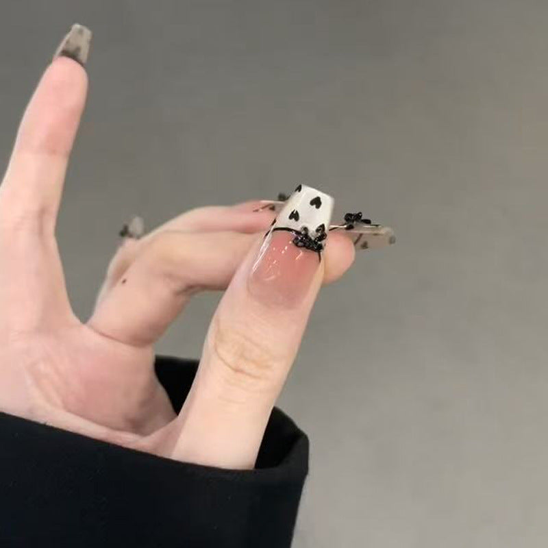Artistic Press-On Nail Tips with Heart Accents Kalsten