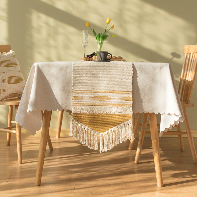 Handwoven cotton-linen table runner with fringes and textured decorative stripe