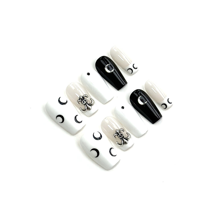 Artistic Press-On Nail Art Set with Elegant Moon and Star Designs