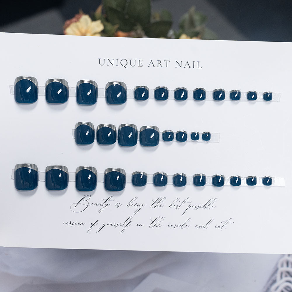 Press-On Nail Art with Elegant Gold Accents
