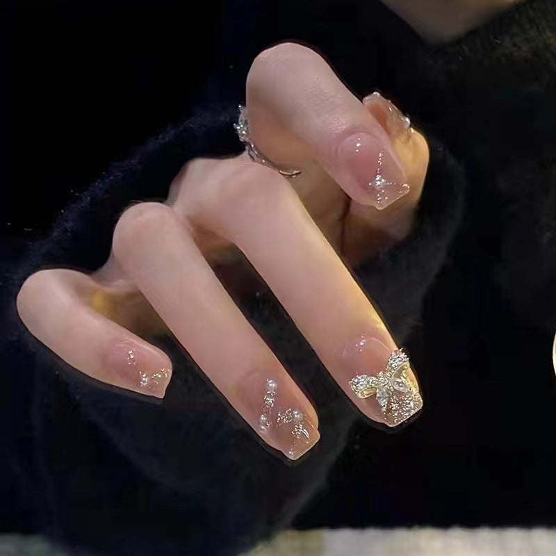 Artificial nails in an elegant design with 3D butterflies and glitter accents Kalsten