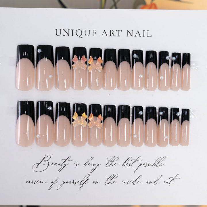 Decorative Press-On Nail Art with Elegant Bow Accents