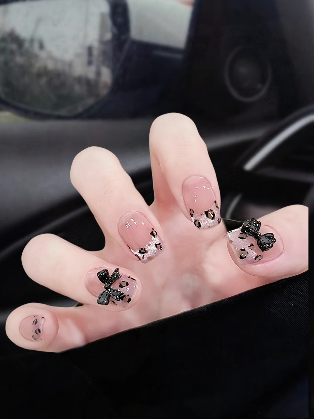 Artistic Press-On Nail Set with Playful Bow and Animal Print Designs