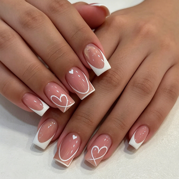 Heart-Embellished French Tip Nail Art Kalsten