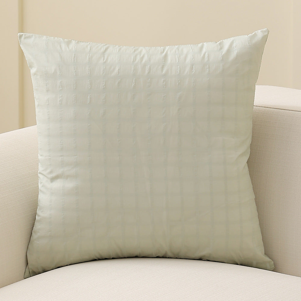 Square decorative cushion with delicate mother-of-pearl look and fine micro tuft structure