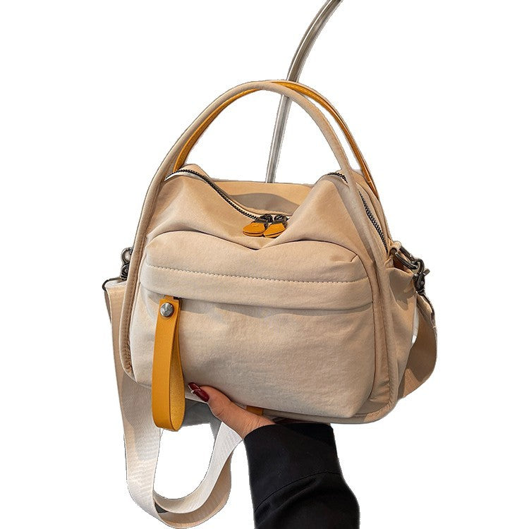 Fashionable shoulder bag with innovative structure and detachable carrying strap Kalsten