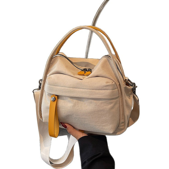 Fashionable shoulder bag with innovative structure and detachable carrying strap Kalsten