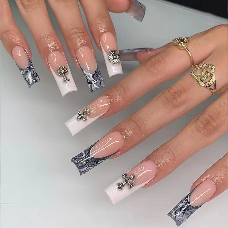Exquisite artificial nails with textured designs and jewelry accents Kalsten