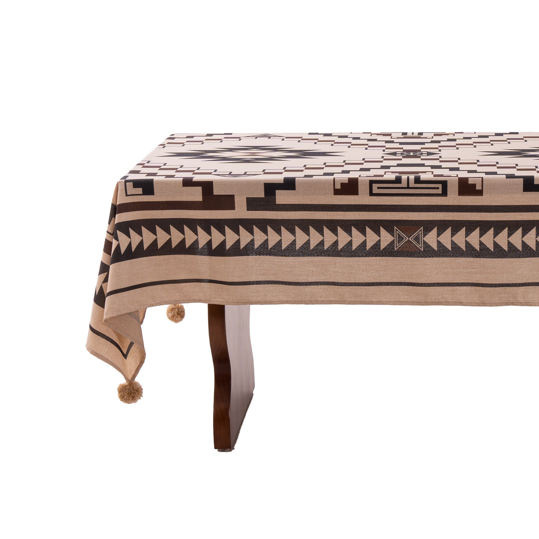 Woven tablecloth with ethnic Aztec pattern and pompom tassels