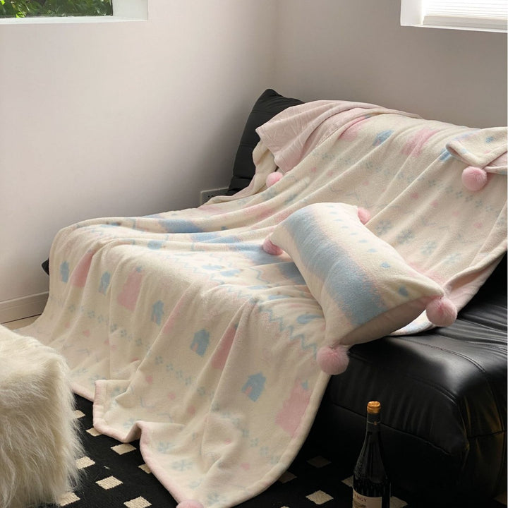 Soft blanket made of microfleece with pompom and Nordic bear pattern