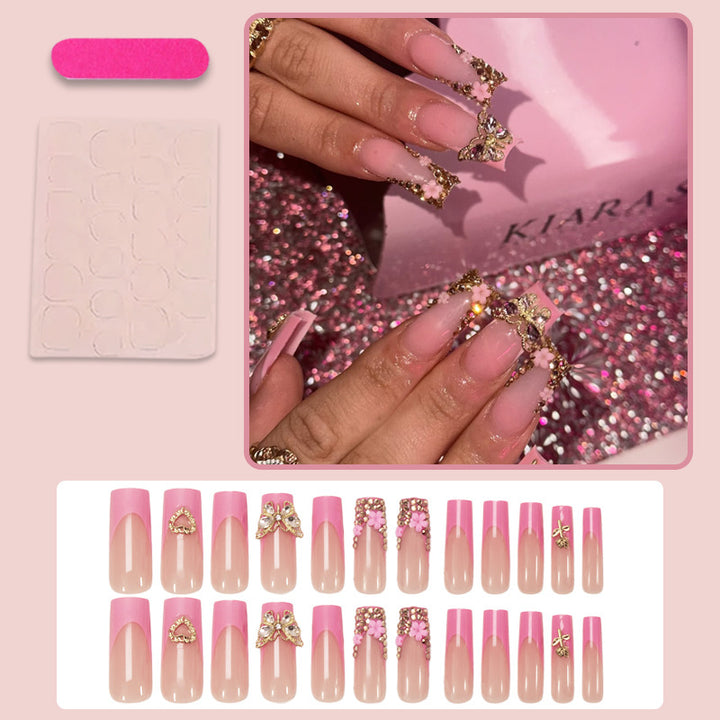 Artificial nail extension with glamorous embellishments Kalsten