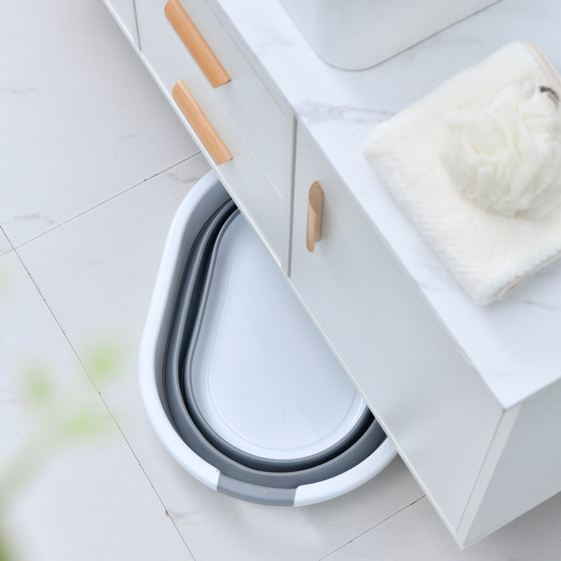 collapsible multi-purpose wash basin made of silicone and plastic