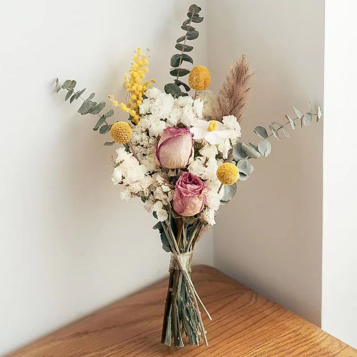 Elegant Floral Arrangement in Glass Vase