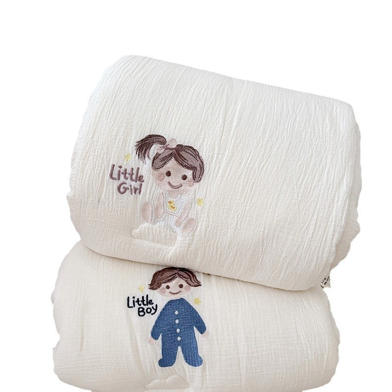 Children's quilt made of cotton muslin with embroidered doll motif