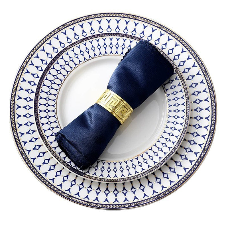 Luxurious metal napkin ring with Greek meander ornament
