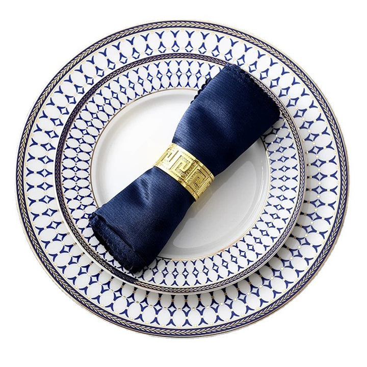 Luxurious metal napkin ring with Greek meander ornament