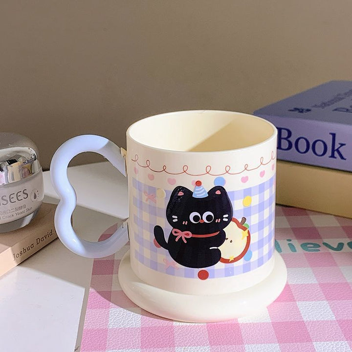 Ceramic mug with playful cat motif Kalsten