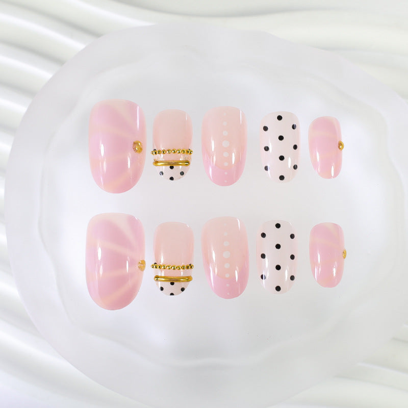Acrylic nail set with elegant polka dot and glamorous golden accents Kalsten