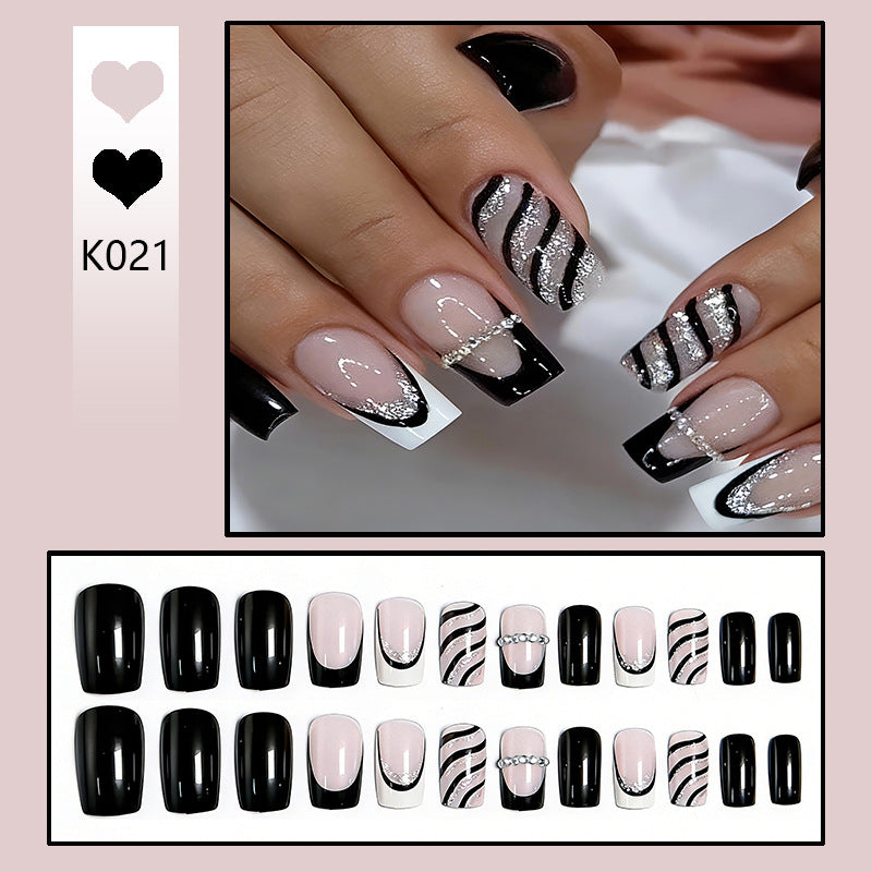 Artificial nail set with glamorous glitter and stripe designs Kalsten