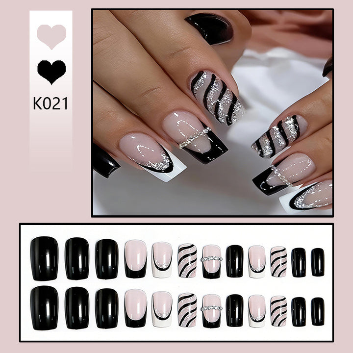 Artificial nail set with glamorous glitter and stripe designs Kalsten