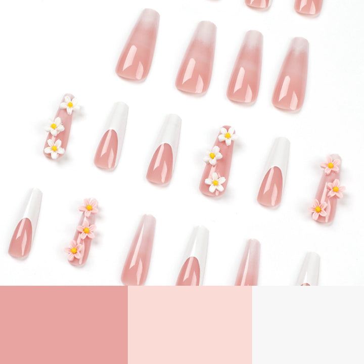 Artful nail extensions with elegant gradient and creative floral accents Kalsten