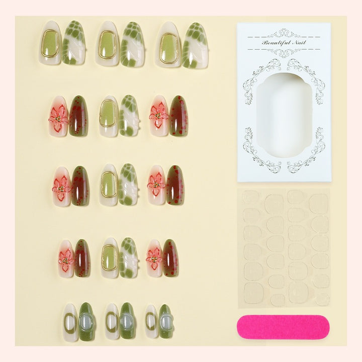 Artificial nail set with elegant floral designs and color accents Kalsten