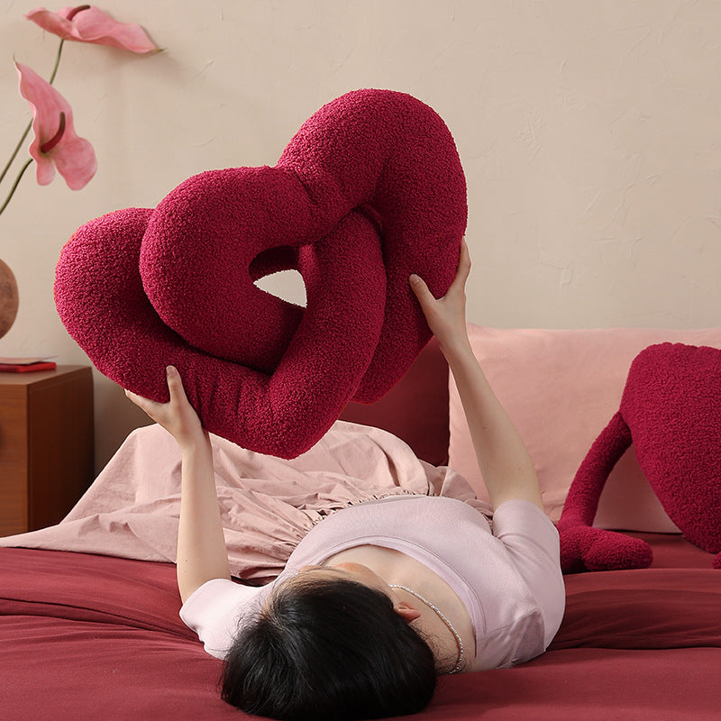 Braided heart cuddle pillow duo with bouclé cover and flexible filling