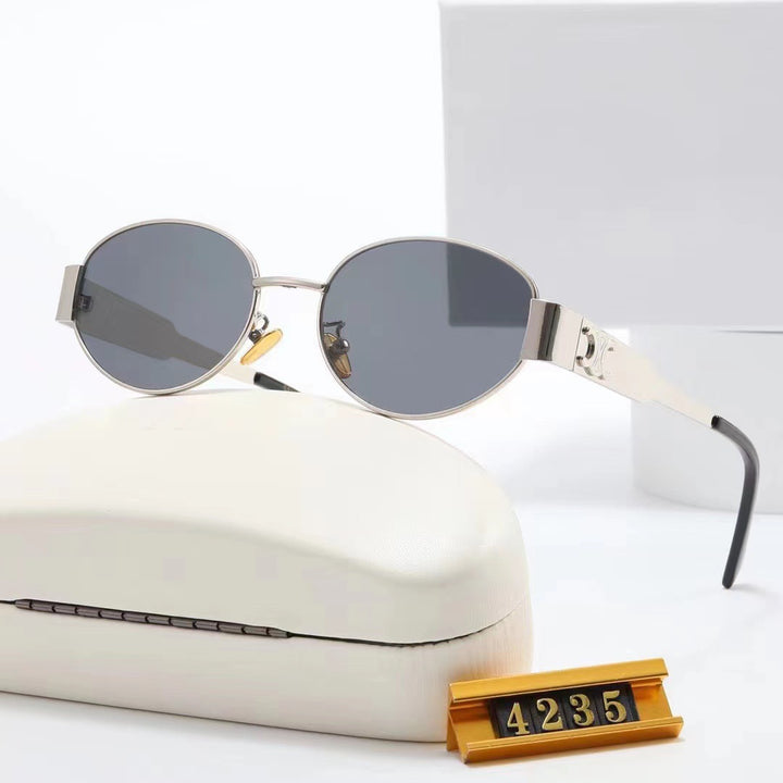 Women elegant oval sunglasses with gold-colored frame Kalsten