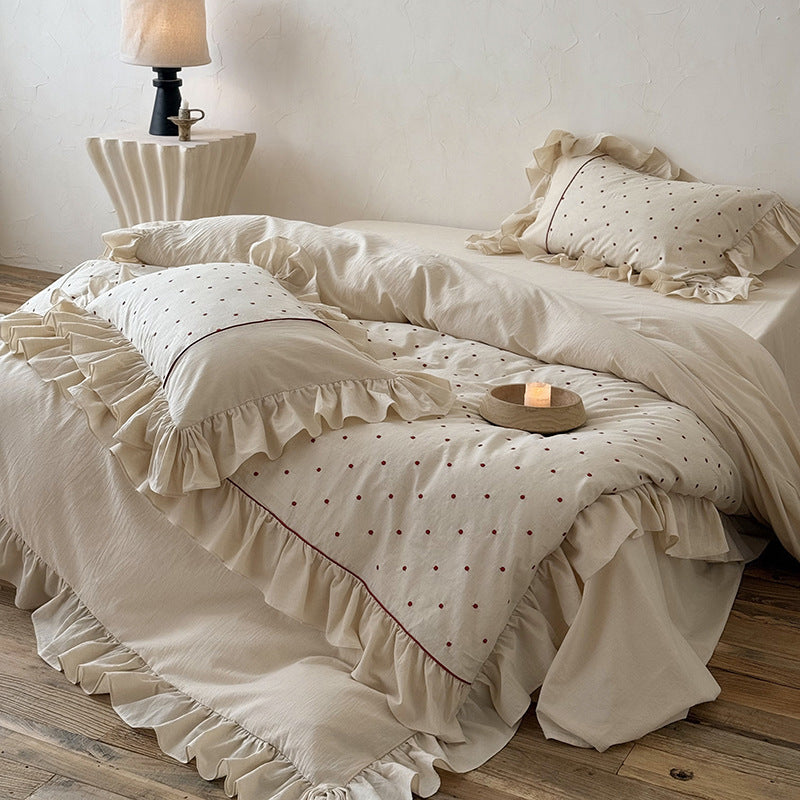 Duvet cover set with ruffle, embroidered dots, and stonewashed cotton finish