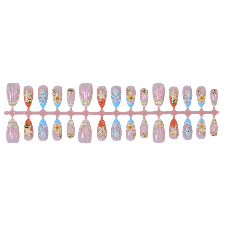 Creative nail art set with maritime designs and elegant embellishments Kalsten