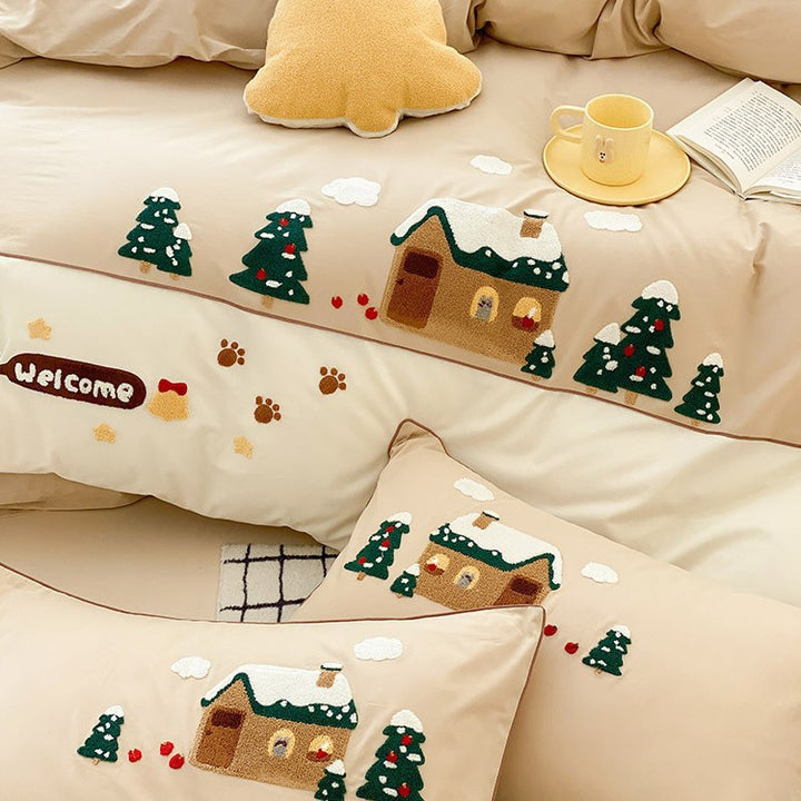 Cozy bedding set with embroidered winter house and Christmas tree motifs