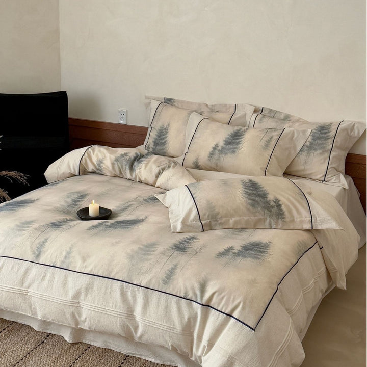 Bedding set made of high-quality cotton satin with subtle forest watercolor print and contrasting piping