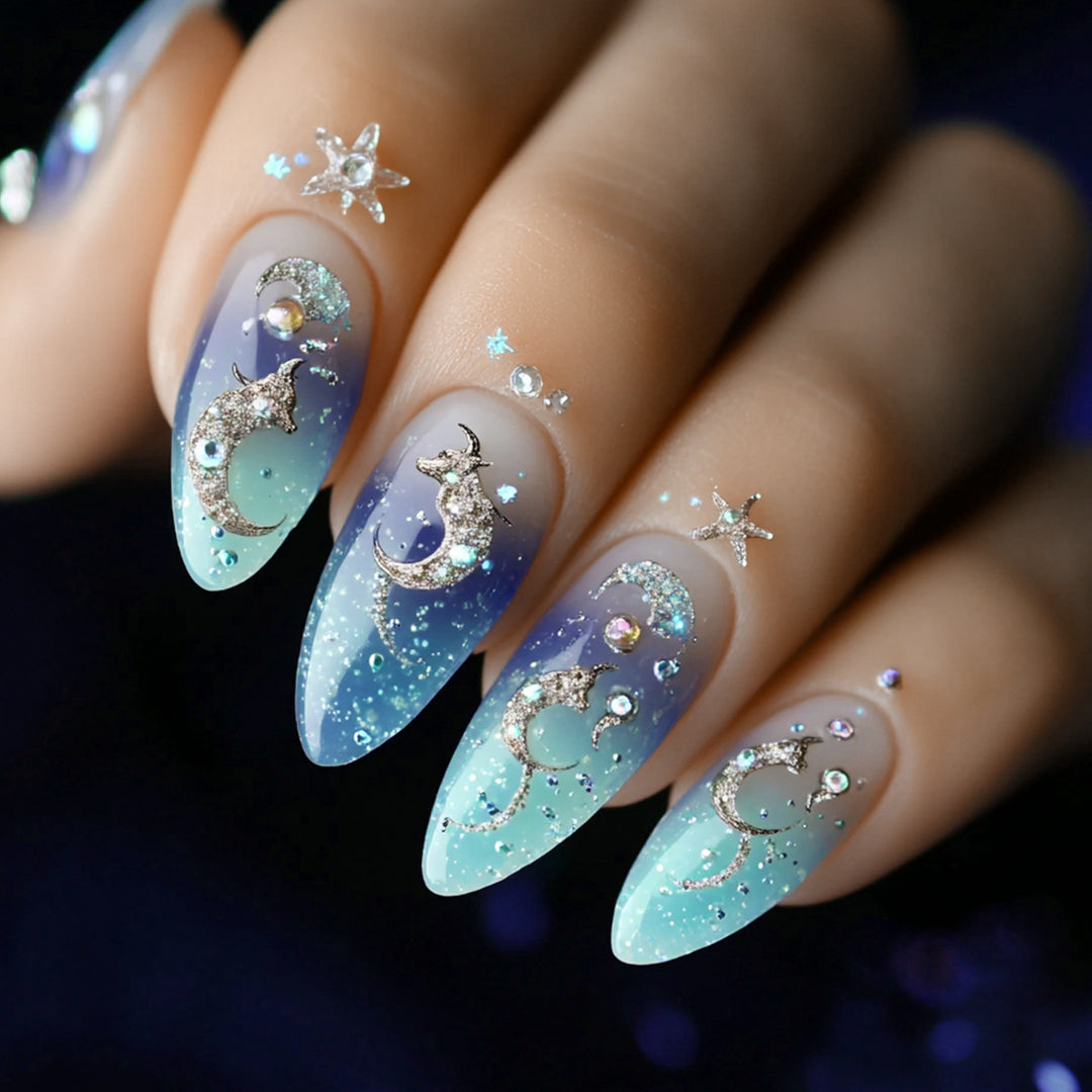 Artistic stiletto nails with glitter and marine motifs Kalsten