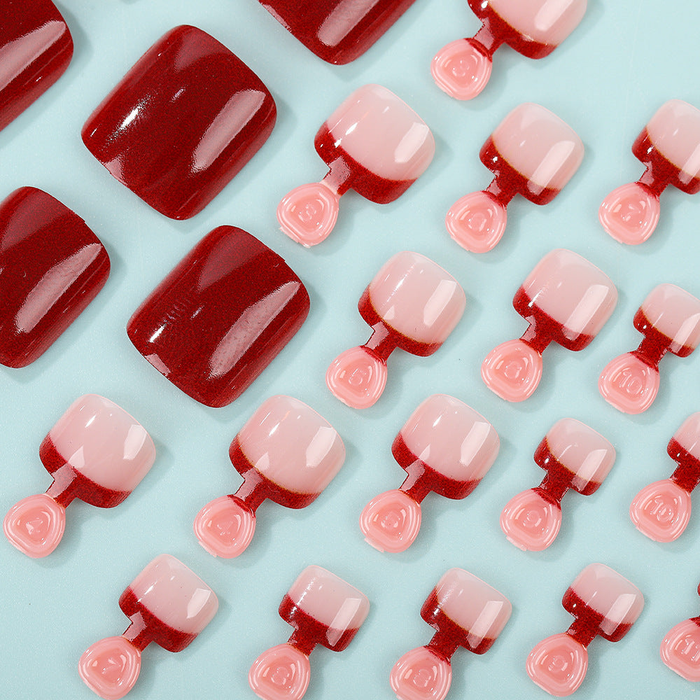 Acrylic nail set in elegant red and nude design Kalsten