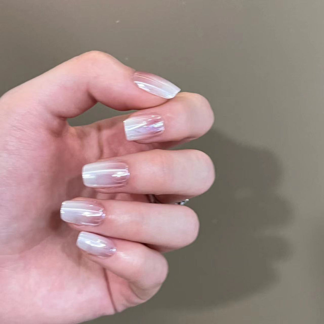 Artificial nail extensions in elegant ombre design Kalsten