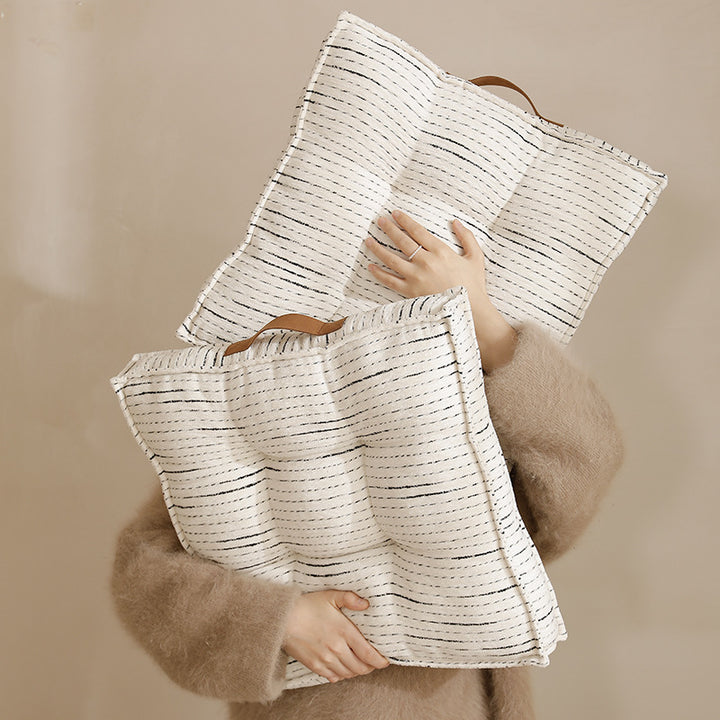 Padded square seat and floor cushion with quilted tufted padding and carrying handle Kalsten
