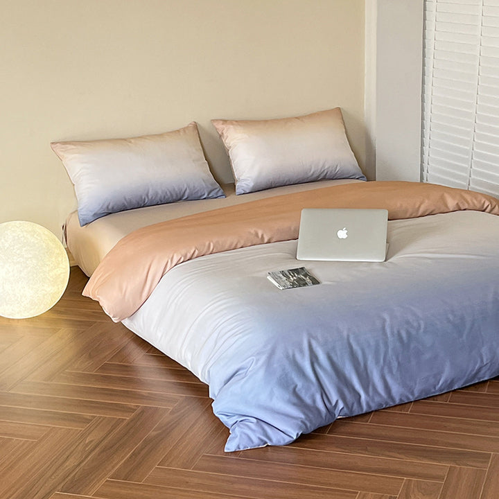Reversible cotton satin bedding set with a gentle color gradient, wrinkle-free finish, and zipper