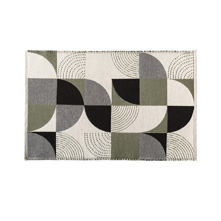 Flat-woven living room rug in a graphic tile pattern
