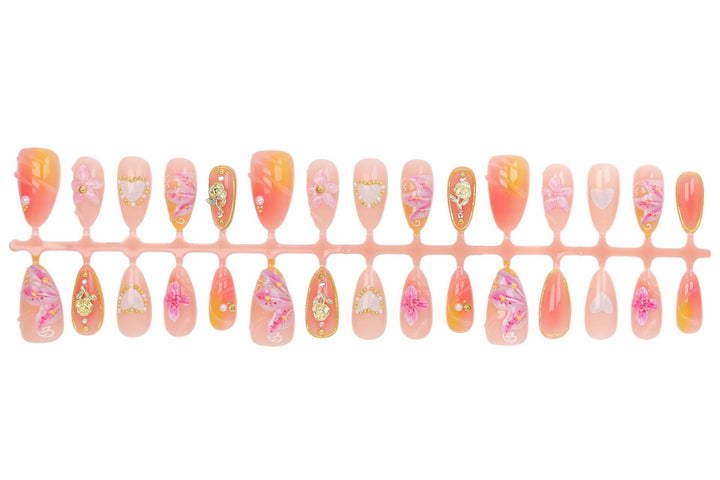 Artificial nail set with delicate flower designs and glamorous accents Kalsten